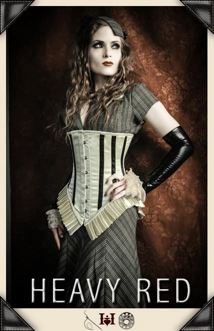 Vintage - style women's bustiers with lace and bowsLost In Whimsy Antique Corset
